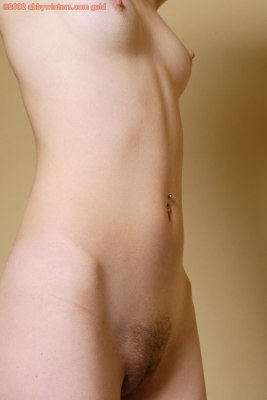 Ze wordt opgewonden wanneer ze haar vagina open spreidt erg geil