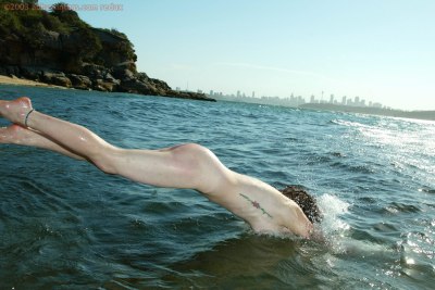 Mijn vriendin zonder bikini op het strand